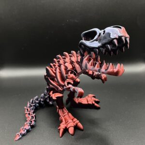 Articulated skeleton T-Rex in the color red/black