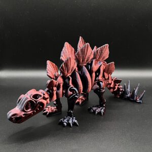 Articulated skeleton Stegosaurus in the color red/black
